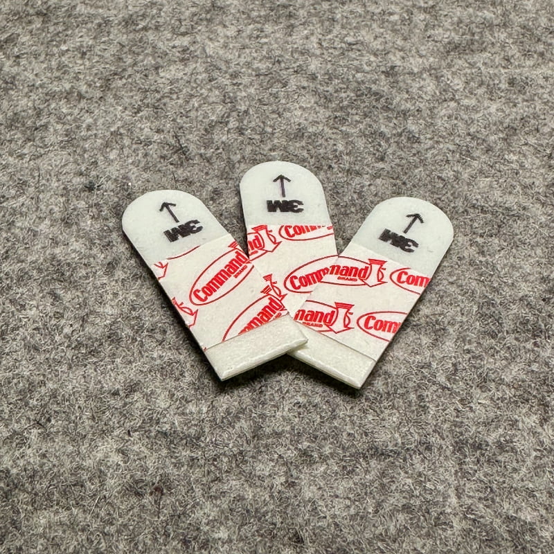 3M Command™ adhesive strips used for mounting backspacers