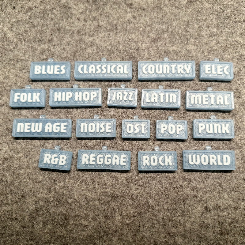 3D-printed music genre shelf tags in blue with white letters